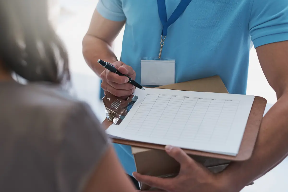 person med clipboard